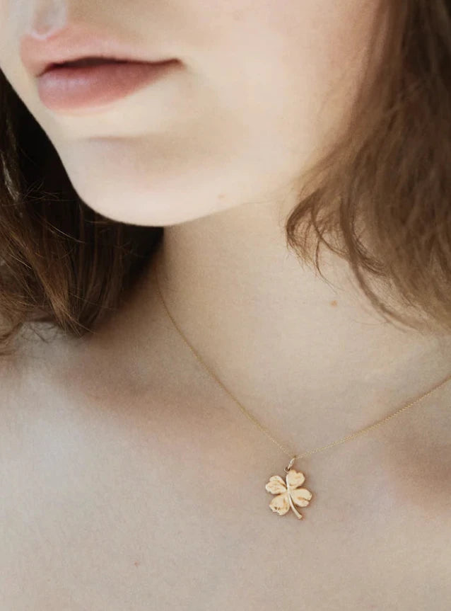 Aida lucky clover mini gold necklace close up