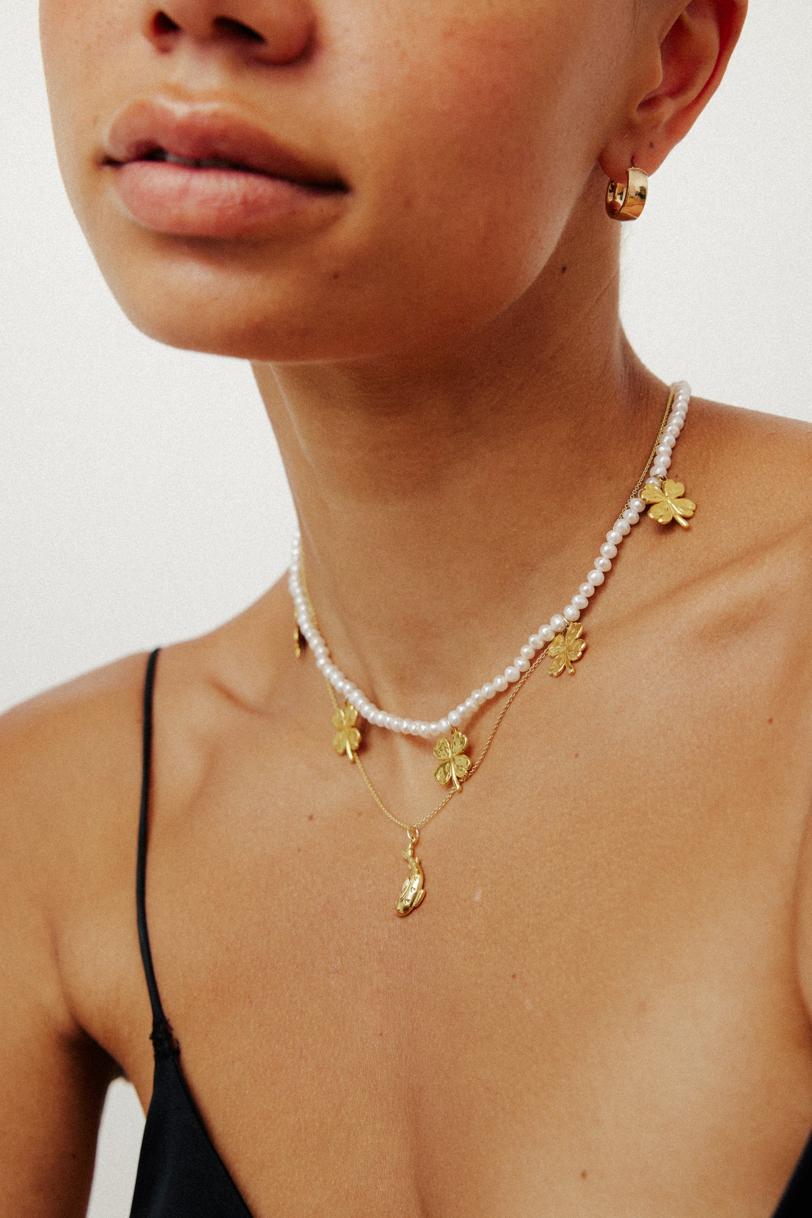 Pearls with AIDA Amulets