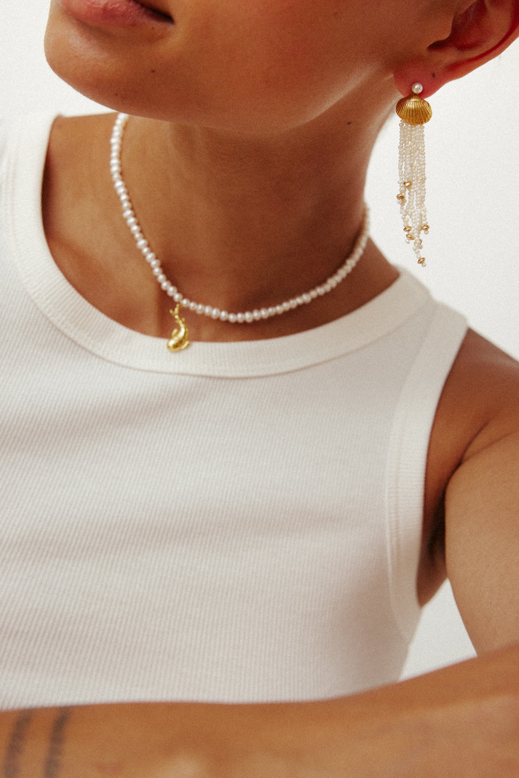 Pearls with AIDA Amulets