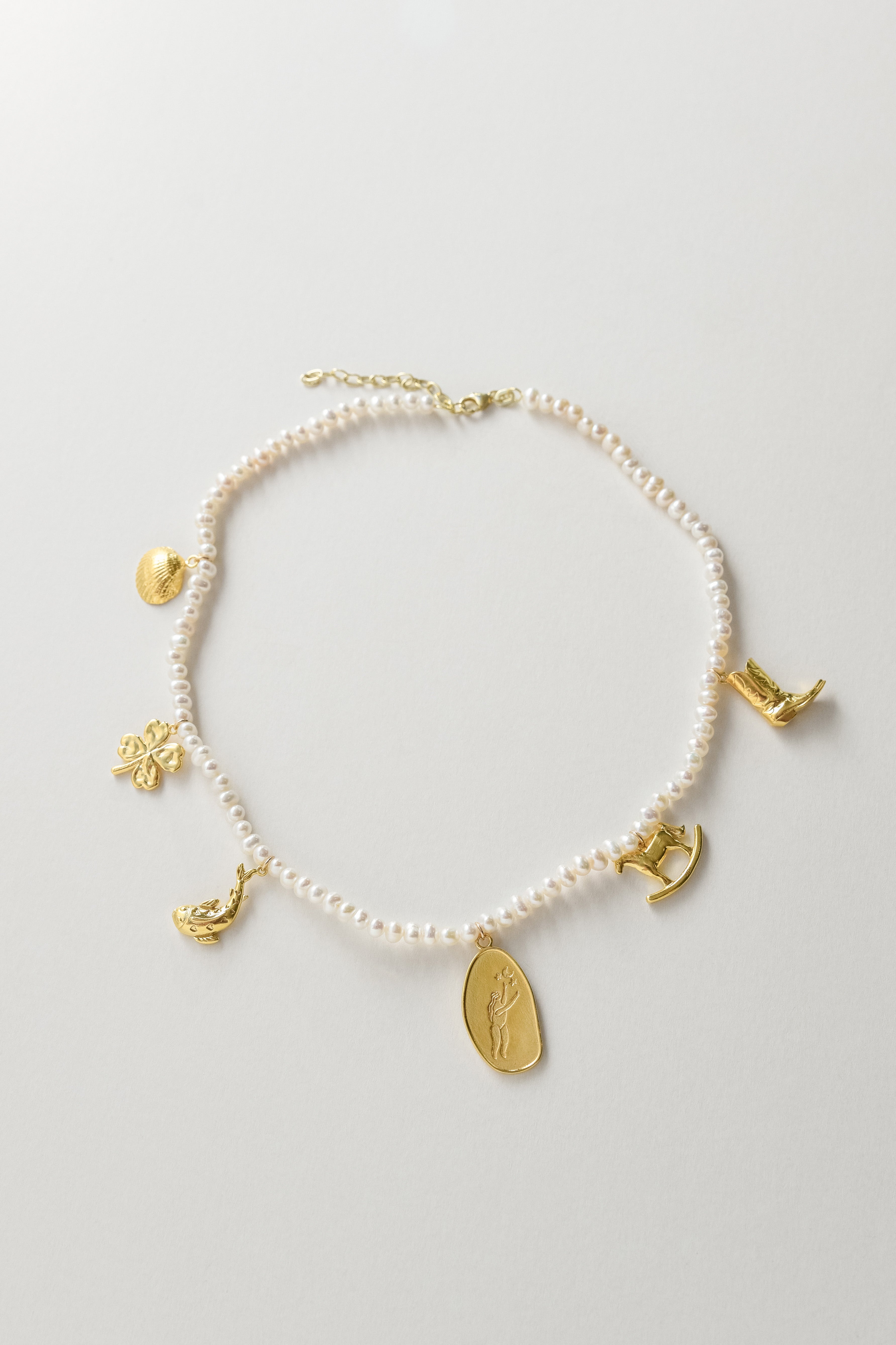 Pearls with AIDA Amulets
