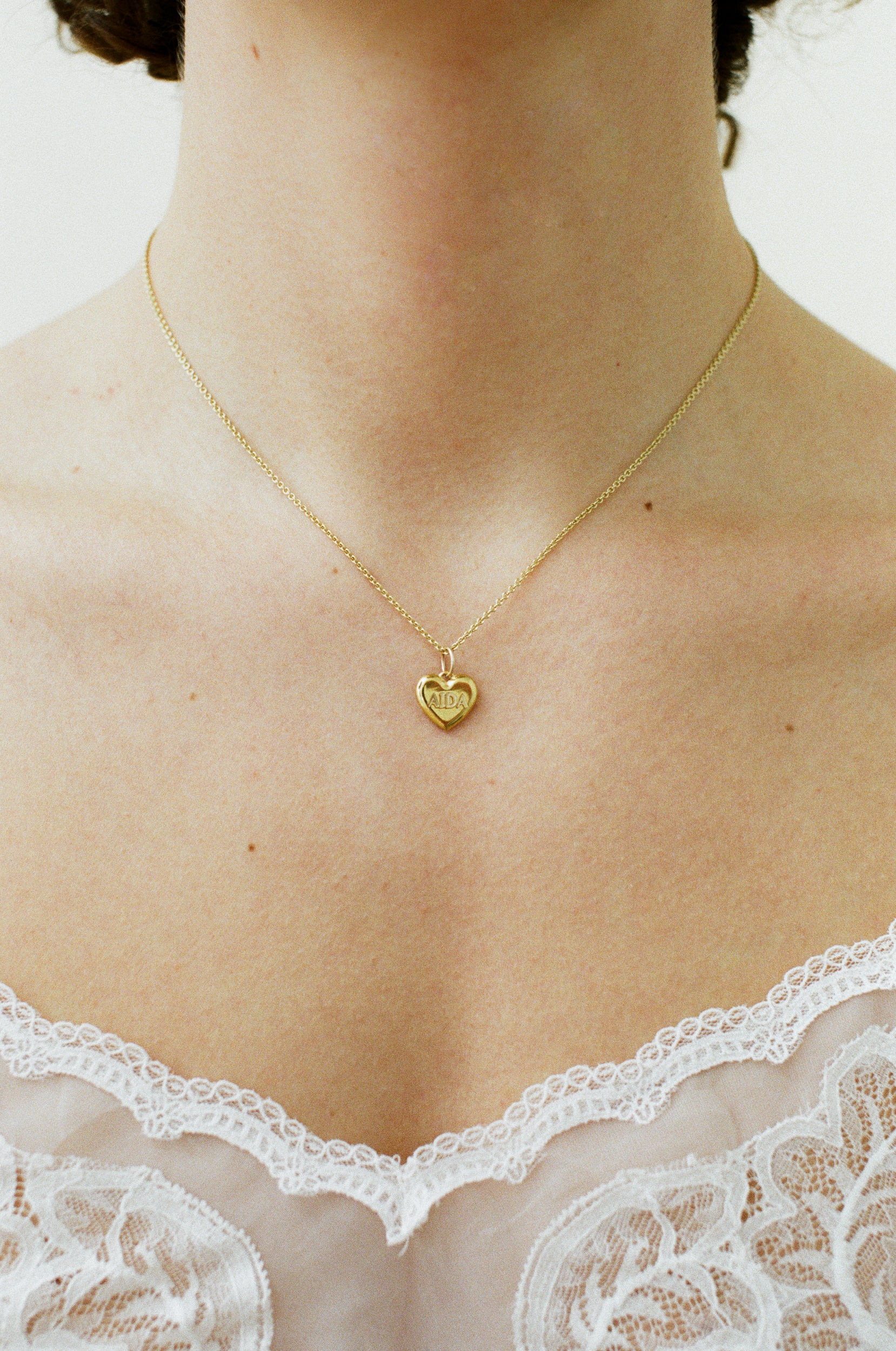 aida impact heart pendant necklace gold